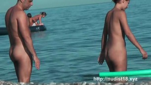 Nudists splash around in the water flashing asses and boobs